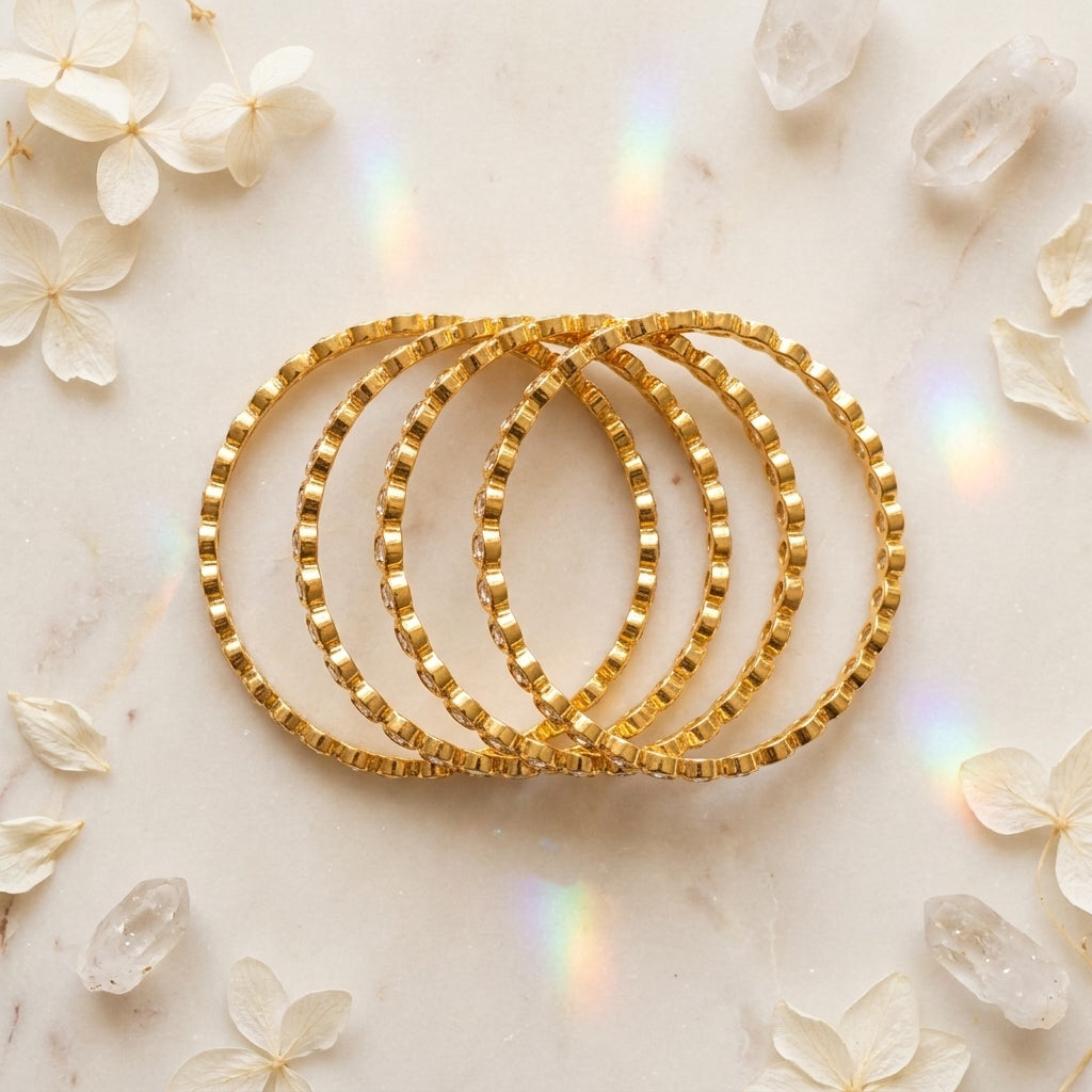 Aurora Spark Gold Plated American Diamond Slim Bangles Set for Women | 4 Piece Designer Stackable Bangles