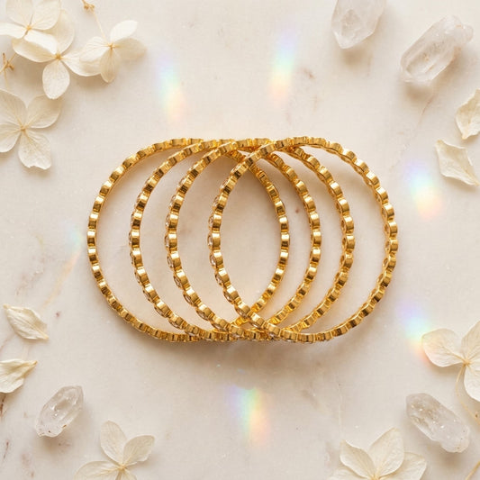 Aurora Spark Gold Plated American Diamond Slim Bangles Set for Women | 4 Piece Designer Stackable Bangles