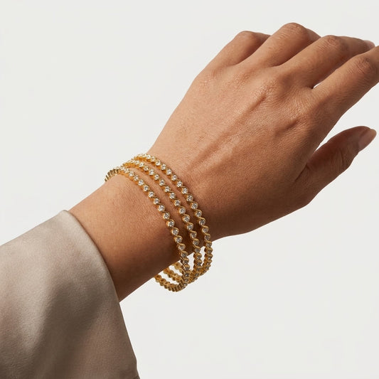 Celestial Twist Gold Plated American Diamond Slim Bangles Set for Women | 4 Piece Designer Stackable Bangles