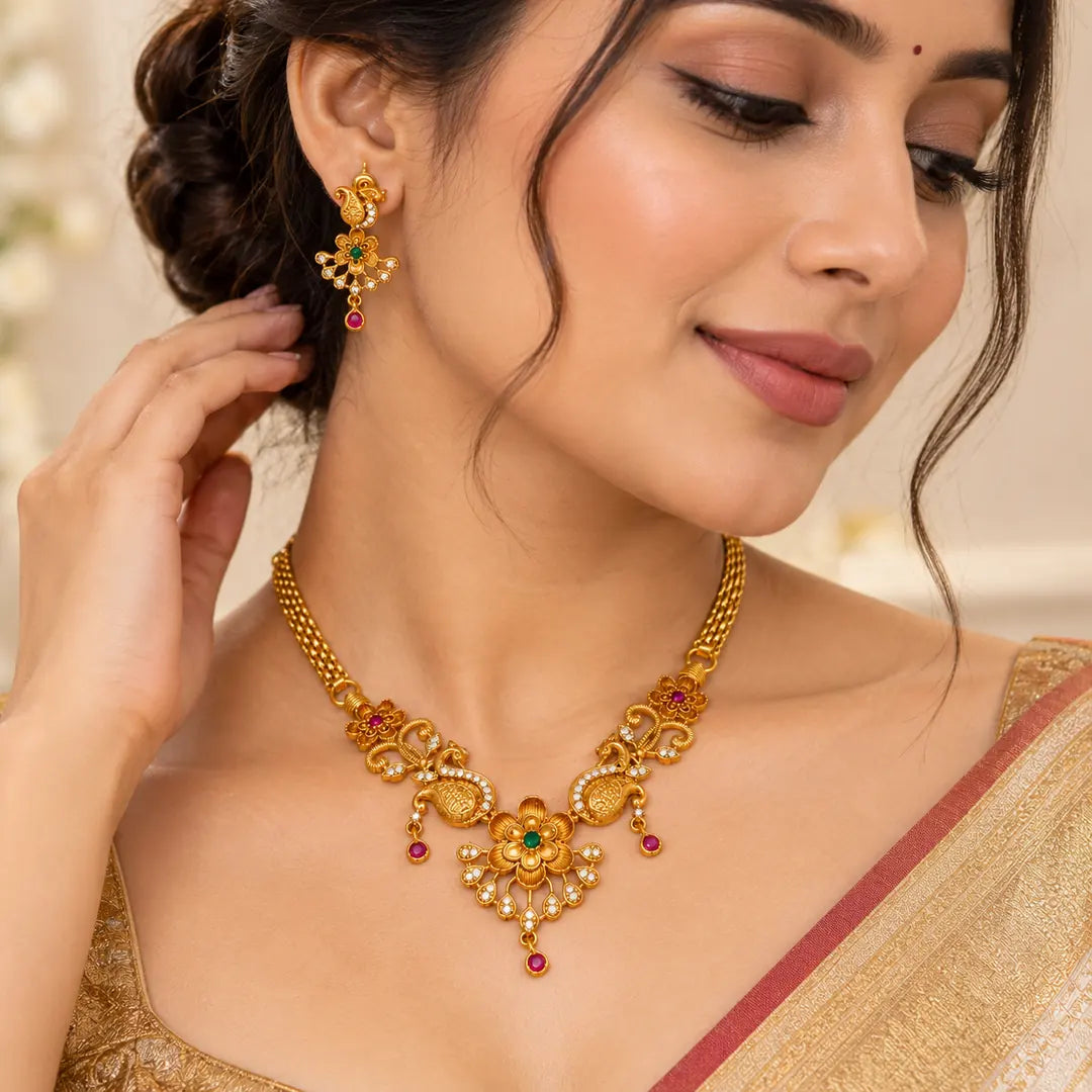 floral peacock gold-tone necklace set with matching earrings