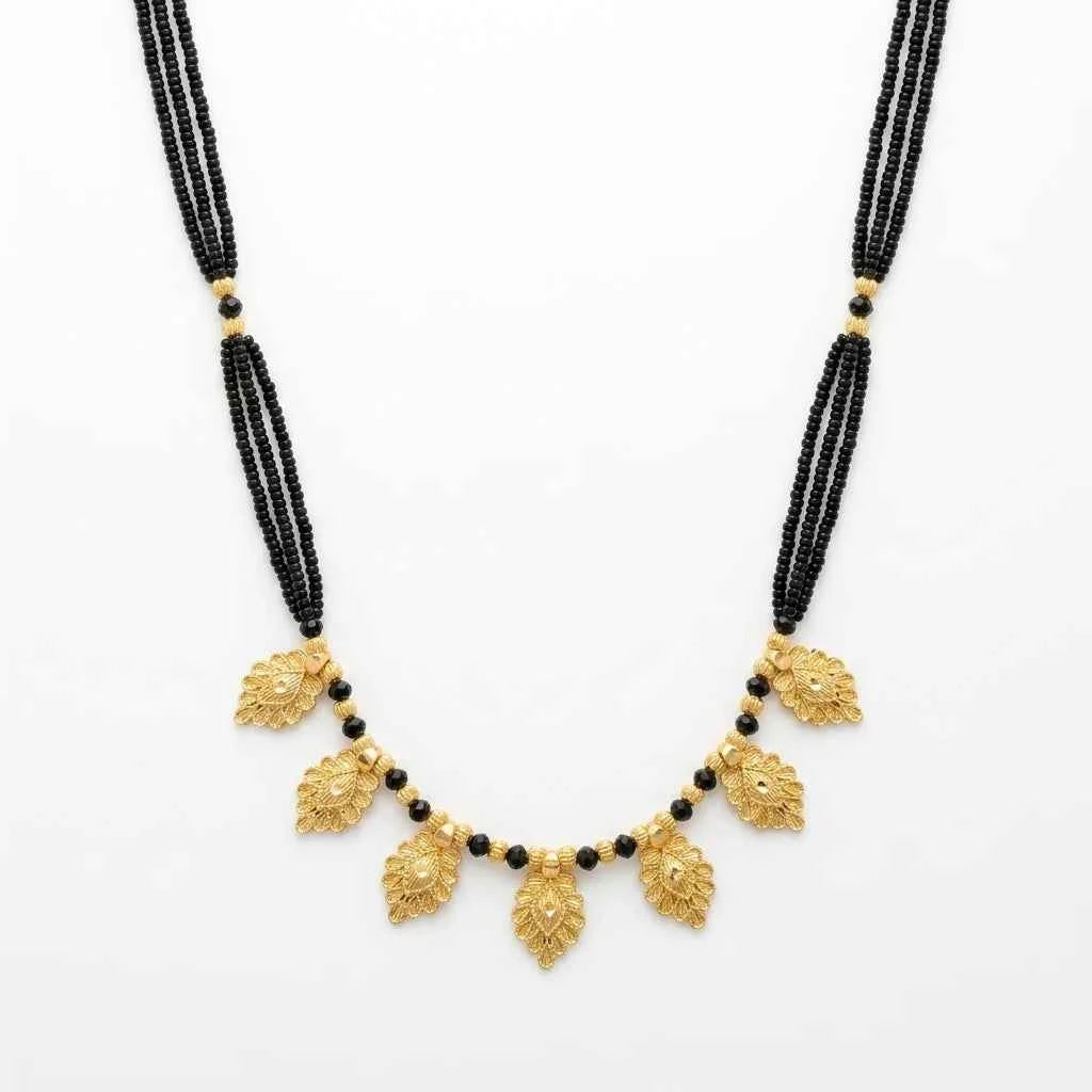 gold plated leaf design short mangalsutra for women | traditional black bead designer necklace