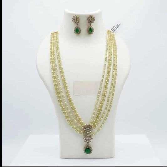 GEHNA OFFICIAL layered necklace set with green and pearl beads, floral American Diamond centerpiece, and matching earrings