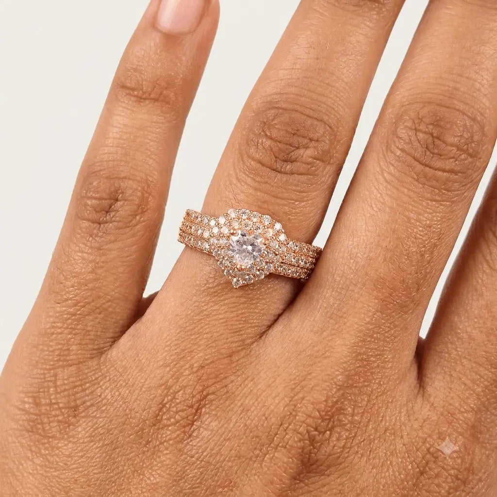 gehna official gold plated ring featuring a white heart-shaped stone surrounded by sparkling zircon on a woman's finger