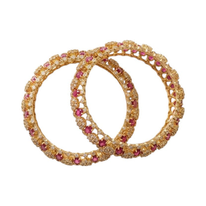 GEHNA OFFICIAL gold plated bangles featuring ruby oval stones and American diamond accents in an openwork design.