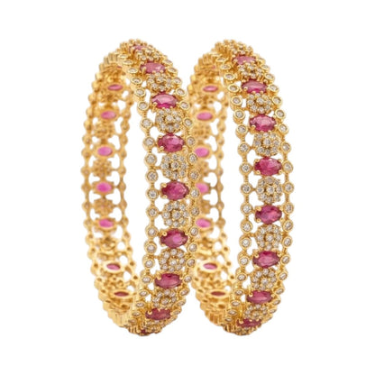 GEHNA OFFICIAL gold plated bangles featuring oval ruby stones and sparkling American diamonds in an openwork design.
