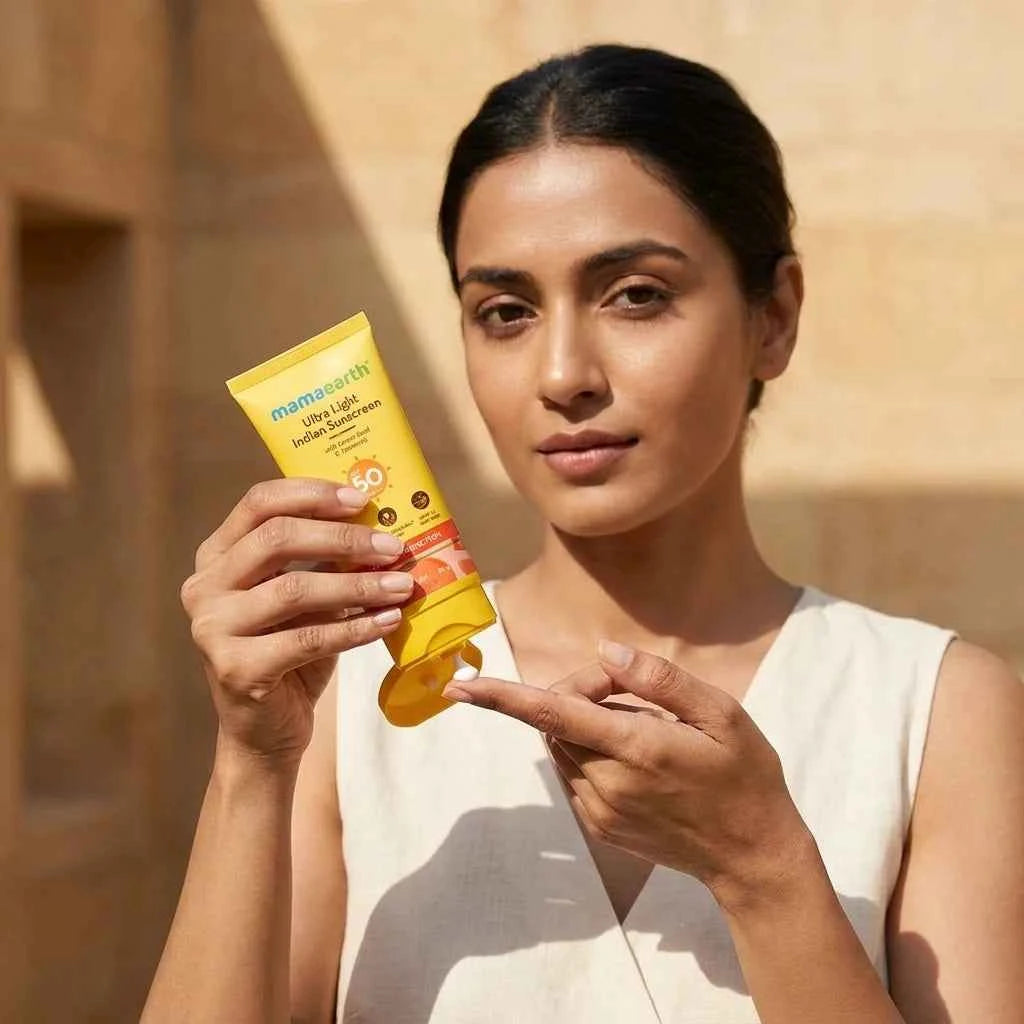 mamaearth ultra light indian sunscreen spf 50 pa+++ 50g with carrot seed & turmeric | broad spectrum uva & uvb protection | for all skin types